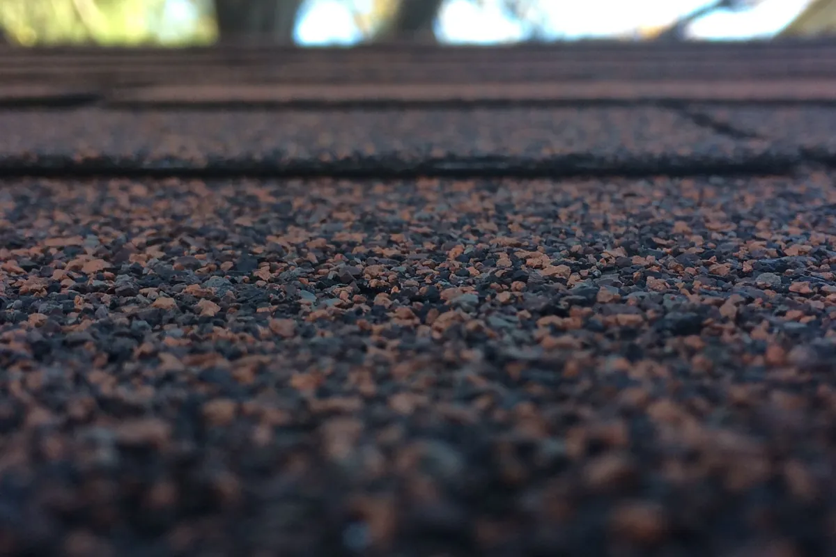 Low close-up of the granule surface of asphalt roof shingles